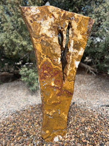 Grand Canyon Red Onyx stone fountain in a landscape setting handcrafted by The Rock Star Gallery®