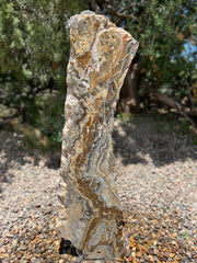 Black Canyon Onyx stone fountain by The Rock Star Gallery in stone garden landscape design.
