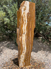 Grand Canyon Red Onyx Infinity Fountain in a landscape setting