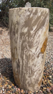 Petrified Wood Infinity Fountain in a landscape setting