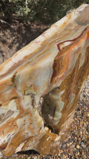 Grand Canyon Red Onyx stone fountain in a landscape setting handcrafted by The Rock Star Gallery®