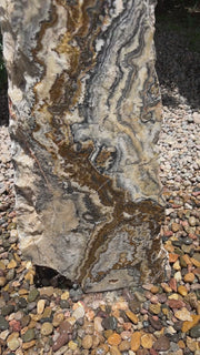 Black Canyon Onyx stone fountain by The Rock Star Gallery in stone garden landscape design.