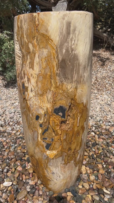 Petrified Wood Infinity Fountain in a landscape setting