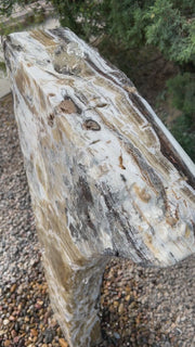 Black Canyon Onyx stone fountain in a landscape setting