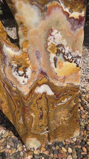 Grand Canyon Red Onyx stone fountain in a landscape setting handcrafted by The Rock Star Gallery®