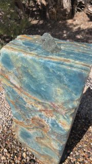 Argentine Aquamarine Onyx Stone Fountain in a landscape setting from The Rock Star Gallery
