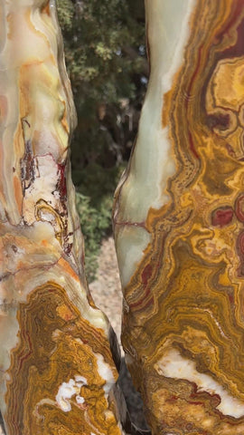 Grand Canyon Red Onyx stone fountain in a landscape setting handcrafted by The Rock Star Gallery®