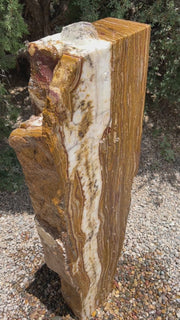 Grand Canyon Red Onyx Infinity Fountain in a landscape setting