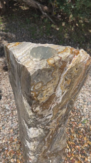 Black Canyon Onyx stone fountain by The Rock Star Gallery in stone garden landscape design.