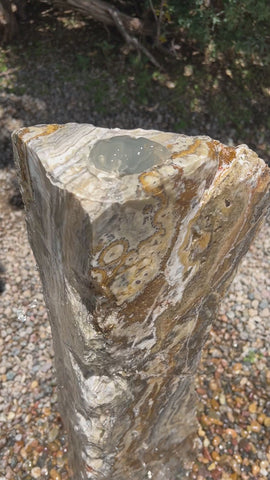 Black Canyon Onyx stone fountain by The Rock Star Gallery in stone garden landscape design.