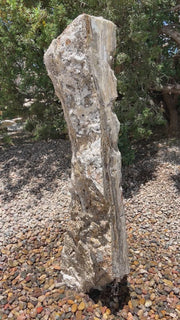 Black Canyon Onyx stone fountain by The Rock Star Gallery in stone garden landscape design.