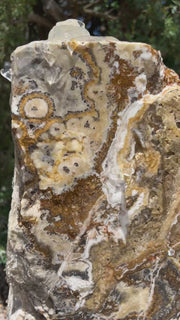 Black Canyon Onyx stone fountain by The Rock Star Gallery in stone garden landscape design.