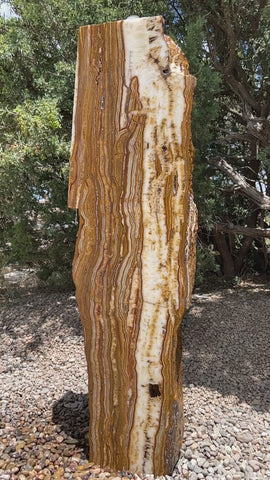 Grand Canyon Red Onyx Infinity Fountain in a landscape setting