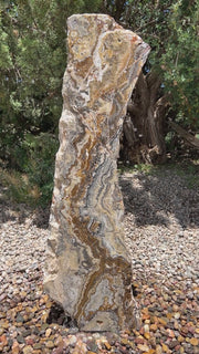 Black Canyon Onyx stone fountain by The Rock Star Gallery in stone garden landscape design.