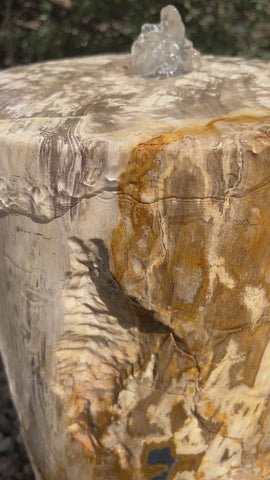 Petrified Wood Infinity Fountain in a landscape setting