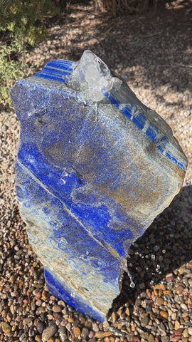 Blue Lapis Lazuli stone fountain by The Rock Star Gallery in outdoor setting.