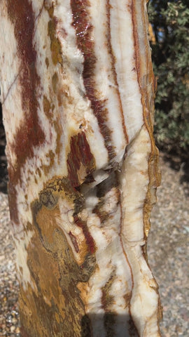 Grand Canyon Red Onyx stone fountain in landscape setting by The Rock Star Gallery.