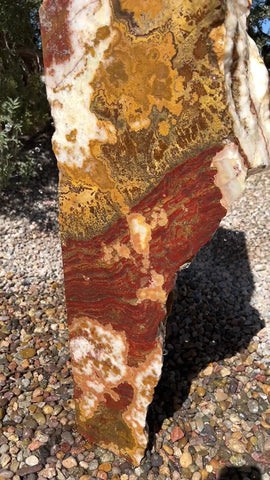 Grand Canyon Red Onyx stone fountain in landscape setting by The Rock Star Gallery.