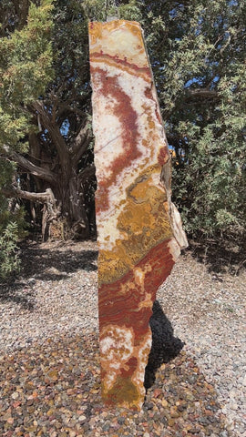 Grand Canyon Red Onyx stone fountain in landscape setting by The Rock Star Gallery.