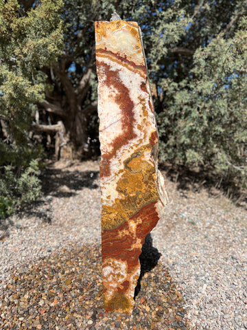 Grand Canyon Red Onyx stone fountain in landscape setting by The Rock Star Gallery.