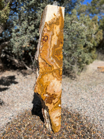 Grand Canyon Red Onyx stone fountain in landscape setting by The Rock Star Gallery.