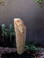 Sunrise Onyx Stone Sculpture with internal LED lighting for interior design or landscape design setting.