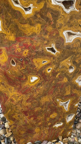 Verde Canyon Onyx stone fountain by The Rock Star Gallery® in a courtyard setting.