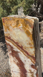 Grand Canyon Red Onyx stone fountain in landscape setting by The Rock Star Gallery.