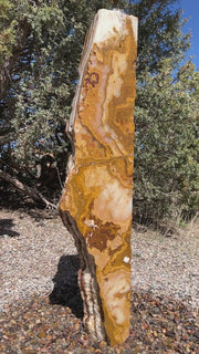 Grand Canyon Red Onyx stone fountain in landscape setting by The Rock Star Gallery.
